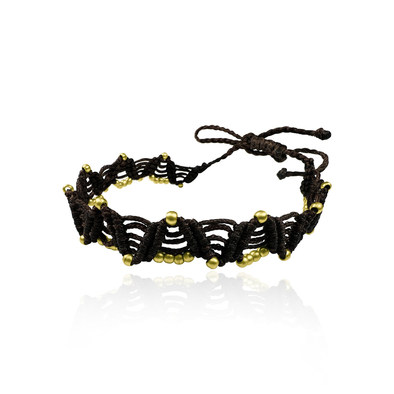 צמיד מקרמה ליד או לרגל בעבודת יד בצבע שחור עם עם חרוזי בראס מוזהבים